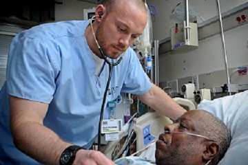 Doctor taking care of patient in hospital