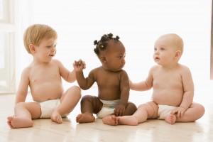 bigstockphoto_Three_Babies_Sitting_Indoors_H_4136697
